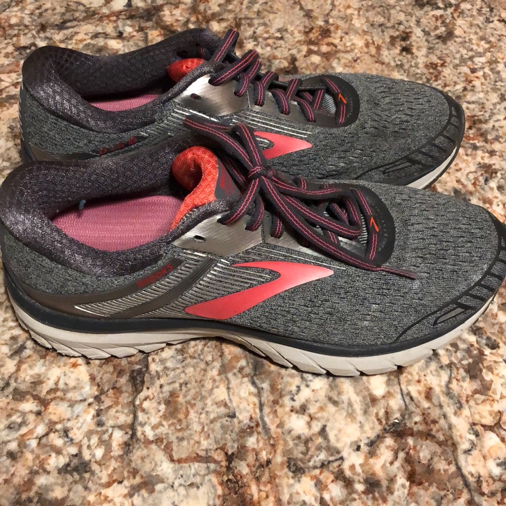 Gray and pink Brooks shoes
